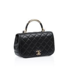 Chanel introduced their popular Carry Chic Flap bag in their Spring / Summer 2017 Act 1 collection. Carefully crafted in the brand's signature lambskin quilted leather, this unique, seasonal piece features a gold tone top handle with two leather side details and a half leather, half leather / chain interwoven strap. A gorgeous bag that can easy take you from day to night, this bag is suitable for any time and any place. A romantic handbag that oozes luxury, the Carry Chic Flap is a well-worthy investment for any luxury handbag lover. With a vintage-like aesthetic, the Carry Chic offers the best of most world by balancing classic elegance and modern femininity. Sleek, stylish and sophisticated, this timeless piece is a purchase you won't regret. SPL Exterior  Black lambskin leather Gold ton Gorgeous Bags, Luxe Fashion, Spring Summer 2017, Exclusive Bag, Quilted Leather, Leather Chain, Flap Bag, Classic Elegance, Lambskin Leather