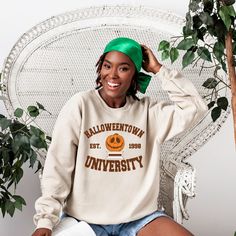 Cute college style halloweentown university halloween sweatshirt. We now use a process to print our shirts that will allow the design to last longer if properly cared for, over 40 washes.In order to provide quick turnaround, we source from four different top clothing brands. If you are needing a specific brand, check with us before ordering for availability.Except for our crop tops, the shirts are UNISEX sizing, it runs larger for women and fit men true to size. Halloweentown University, Best Halloween Movies, Top Clothing Brands, Initial Sign, Blue Words, Top Clothing, University College, College Style, Halloween Movies