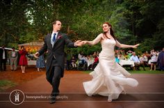 a bride and groom dancing at their wedding reception