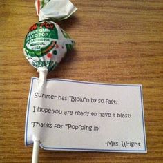 a lollipop with a note attached to it