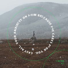 a man standing on top of a snow covered field next to a green circle with words written in it