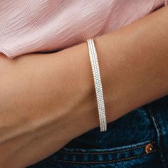 This everyday 14K white or yellow gold bangle bracelet adds a touch of sheer brilliance to any look, whether it's worn solo or stacked with other accessories. The versatile design allows you to mix and match and make it your own. Natural Diamond: 1.55ctw 14K White or Yellow Gold Width: 4.5mm Wrist Size: 46 x 56mm (small-medium) Mavilo Exclusive Elegant Everyday Stackable Diamond Bracelet, Luxury White Bracelets For Everyday, White Gold Bangle Chain Bracelet For Everyday Luxury, White Gold Bracelets For Everyday Fine Jewelry, Modern White Diamond Bangle Bracelet, White Gold Fine Jewelry Bracelets For Everyday, White Gold Everyday Fine Jewelry Bracelet, Elegant 14k White Gold Cuff Bracelet, Elegant Stackable White Gold Chain Bracelet