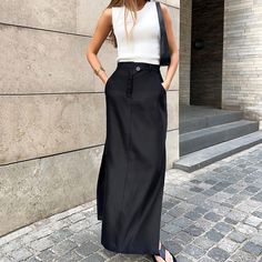 Elevate your autumn office wardrobe with our Elegant Black Split High Waist Drape Skirt for Women. This skirt exudes sophistication with its high waist and a tasteful split design. Crafted with meticulous attention to detail, it's perfect for professional settings and a touch of luxury. Whether you're attending business meetings or presentations, this skirt offers both style and confidence. Embrace the autumn with grace and flair in our Women's High Waist Drape Skirt. High Waist Long Skirt, 여름 스타일, Maxi Rok, High Waisted Maxi Skirt, Ankle Length Skirt, Mode Boho, Womens Maxi Skirts, Langer Rock, Long Skirts For Women