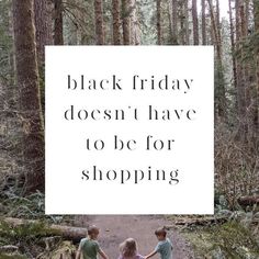 two children holding hands while walking down a path in the woods with text reading black friday doesn't have to be for shopping