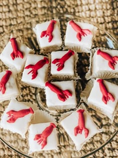 some white and red desserts on a glass plate