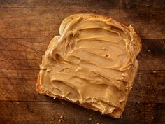 peanut butter spread on top of a piece of bread