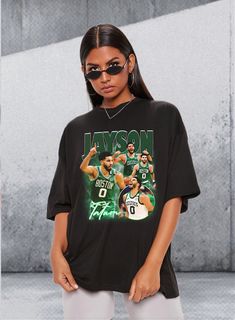 Jayson Tatum, Jaylen Brown, Marcus Smart, Grant Williams Shirt, Basketball shirt, Classic 90s Graphic Tee, Unisex, Vintage Bootleg, Retro Material: 100% ring-spun Cotton (fiber content may vary for different colors) .: Light fabric (4.5 oz/yd² (153 g/m .: Eurofit .: Tear-away label .: Runs true to size PLEASE NOTE: Model is wearing XL to get desired oversized look. All shirts fit Euro Style and are true to size. If you want an oversized look it is recommended to order 2 sizes up. Brand: Gildan Adult Unisex Softstyle Colorway: Black, White Style: Direct to Garment! PLEASE MAKE SURE THE ADDRESS, COLOR, & SIZE ARE ALL CORRECT BEFORE ORDERING.  NO REFUNDS ARE AVAILABLE; EXCHANGES ARE ACCEPTED AT SELLERS DISCRETION.   PLEASE MAKE ANY CHANGES TO ORDER WITHIN 24 HOURS OF PURCHASE.   CARE INSTRUCT Oversized 90s Style Fan Merchandise Top, Printed Crew Neck Top For Fan Merchandise, Jayson Tatum Jaylen Brown, Grant Williams, Marcus Smart, Jaylen Brown, Jayson Tatum, Oversized Look, Basketball Shirts