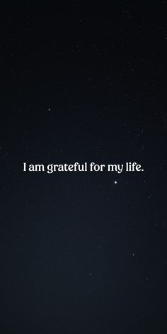 the words i am grateful for my life are written in white on a dark background