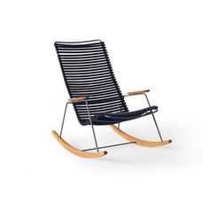 a rocking chair with black and white stripes on the back, in front of a white background