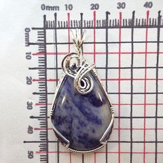 This listing is for a Sodalite from Namibia necklace wire-wrapped in .925 sterling silver wire. Each piece of jewelry is a handcrafted, unique, one-of-a-kind piece of art. The cabochon was shaped and polished by us from a rough gemstone into the unique piece of jewelry you see today. Details: handmade wire-wrapped cabochon pendant gemstone: Sodalite carats: 31.05 ct color: blue, white dimensions: approx 27 X 51 mm or 1.06 X 2.01 inches (large sized) A chain or cord of your choice is included wit Silver Wire Wrapped Teardrop Pendant Jewelry, Sterling Silver Wire Wrapped Teardrop Pendant, Sterling Silver Wire Wrapped Teardrop Pendant Jewelry, Sterling Silver Teardrop Pendant Wire Wrapped Jewelry, Sterling Silver Teardrop Pendant Jewelry Wire Wrapped, Teardrop Healing Jewelry Wire Wrapped, Unique Handmade Silver-plated Wire Jewelry, Gemstone Pendant In Silver-plated Wire, Handmade Silver-plated Wire Necklaces