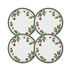 four white plates with green leaves and hearts on the rims, all decorated in black dots