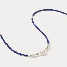 This elegant Blue Seed Bead Necklace is all you need to add a touch of luxe to your ensemble. With its lush navy and pearl beads, it is sure to make a statement. An exquisite upgrade to your jewelry box, it is perfect for those special occasions.   DETAILS Plating: Seed Bead Materials: Seed Bead  Natural  Pearl Measurements: Length: 16.14"(41.0cm) + Extender: 1.57"(4.0cm) Weight: 5.45g Blue Pearl Beaded Necklaces With Pearl Charm, Elegant Blue Pearl Necklace With Polished Beads, Blue Pearl Beaded Necklace With Polished Beads, Blue Pearl Necklaces With Polished Beads, Blue Pearl Necklace With Polished Beads, Elegant Blue Pearl Beaded Necklaces, Elegant Blue Beaded Pearl Necklace, Adjustable Blue Pearl Necklace With Polished Beads, Adjustable Blue Pearl Necklace