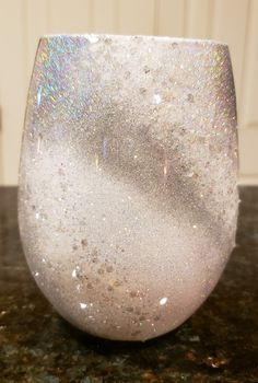 a white glass sitting on top of a counter