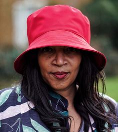 Why not look cheerful and turn heads on a miserable grey day?  This cheerful red bucket hat allows you to do exactly that!  It's handmade from lightweight & fully waterproof polyester - and folds away into its own bag, so can be with you at all time - just in case!It's a ladies rain hat with a medium 3 inch brim which gives you plenty of cover from a quick rainstorm.  Handmade in the UK, the hat is fully adjustable, so even those ladies with small heads can stay dry too!This is our EMMA #FoldInA Red Bucket Hat With Short Brim For Outdoor, Red Bucket Hat For Outdoor, Red Outdoor Bucket Hat With Short Brim, Red Short Brim Bucket Hat For Outdoor, Red Wide Brim Bucket Hat For Outdoor, Waterproof Bucket Hat With Curved Brim, Adjustable Red Sun Hat For Outdoor, Red Short Brim Hat For Outdoor, Casual Red Sun Hat For Outdoor