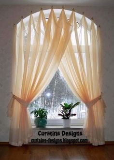 an image of a window with curtains on the windowsills and potted plants