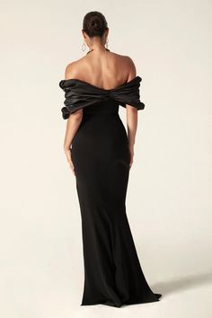 Creating a sculpted silhouette, ‘Persley’ is crafted from our weighty crepe with satin finishing and fits like a glove through the body before flaring out at the knees to a sweeping train. The corseted bodice keeps your torso cinched and fully supported and the way it dips to the front creates a perfect hourglass silhouette. The languidly sexy ruffle off shoulder collar finish the elegant feminine look .The pretty cups under ruffle shoulders are softly lined and underwired for full support and Off Shoulder Satin Dress, Ruffle Shoulder Dress, Elegant Feminine, Glam Dresses, Women Long Dresses, Satin Dress, Black Maxi Dress, Satin Dresses, Nasa