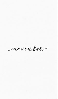 the word november written in cursive ink