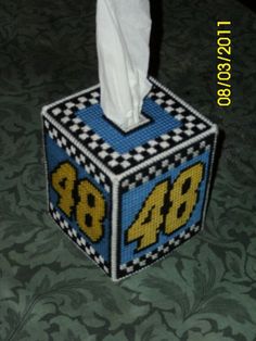 a tissue dispenser made out of lego blocks with the number 28 on it