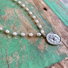 18" sterling silver and freshwater pearl linked chain with 1" sterling silver double sided medal with Sacred Heart on both sides. Silver Medallion Jewelry With Pearl Chain, Silver Medallion Necklace With Pearl Charm, Prayer Cards, Heart On, Sacred Heart, Fresh Water, Freshwater Pearls, Double Sided, Charms