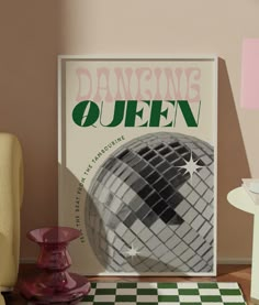 a poster with the words dancing queen on it in front of a chair and checkered rug