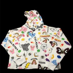 Care Bear Hoodie Spring Cartoon Print Hoodie Top, Trendy Hooded Tops With Graphic Print, Trendy Hooded Top With Graphic Print, Trendy Cartoon Print Hoodie Top, Cute Winter Streetwear Tops, Trendy Hooded Cotton Tops, Trendy Cotton Hooded Top, Cute Hooded Top With Graphic Print, Spring Cotton Hoodie With Cartoon Print