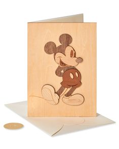 a wooden card with an image of mickey mouse