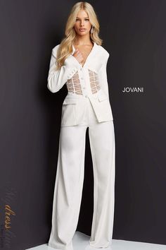 Looking for a stunning pant suit that will accentuate your waist and show off your curves? Look no further than the Jovani 07227 two piece pant suit. This gorgeous suit features an illusion waist that will give you a slimming look, while the lace overlay on the pants and jacket adds a touch of elegance. Whether you're wearing it for a business meeting or a special event, you'll be sure to turn heads in this outfit. Formal Pant Suit, Formal Pant Suits, Formal Pant, Black Tie Wedding Guests, Fitted Pants, Formal Dresses With Sleeves, Corset Dress Prom, Long Sleeve Prom, Jovani Dresses