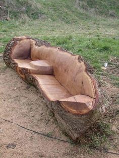 a bench made out of a tree stump