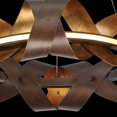 a chandelier made out of wood and metal