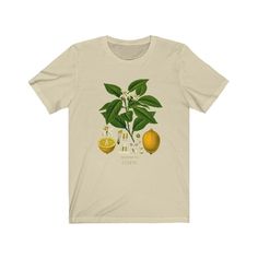 a t - shirt with lemons and leaves on it