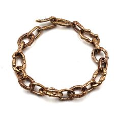 This beautiful Bronze Link Bracelet is perfect for those who want to add a touch of warmth and charm to their outfit. Crafted with high-quality solid Old World Bronze, this accessory will help you make a lasting impression everywhere you go. Its exquisite design features 9 inches of chain links that have been connected together to form a sophisticated circle. This bold beautiful bracelet is both very comfortable and naturally stylish. Whether you’re headed to the office, a special event or anywh Luxury Bracelets With Oval Link Box Chain, Luxury Bracelet With Oval Link Chain, Luxury Oval Link Box Chain Bracelets, Luxury Metal Box Chain Bracelet, Elegant Brass Chain Bracelets, Luxury Brass Bracelets With Adjustable Chain, Luxury Brass Bracelet With Adjustable Chain, Metal Rose Gold Bracelet With Solid Link Construction, Luxury Bracelets With Adjustable Oval Link Chain