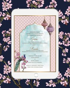 the wedding card is displayed on an ipad with pink flowers and lanterns in the background