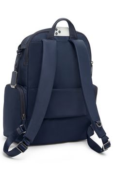 This travel-ready backpack features a handy Add-A-Bag sleeve for sliding onto suitcases along with a durable nylon design and well-organized interior. Top carry handle; adjustable backpack straps Two-way top-zip closure Exterior front zip pockets; side zip pocket; back smartphone pocket; back luggage sleeve Interior zip pockets; padded laptop pocket Nylon/leather Imported This bag includes Tumi Tracer®, an exclusive, complimentary program that helps reunite lost or stolen bags with their rightfu Nylon Luggage For On-the-go, Modern Nylon Luggage For On-the-go, Versatile Laptop Backpack For Trip, Nylon Luggage With Zipper Closure For On-the-go, Travel Laptop Backpack With Anti-theft Pocket, Rectangular Luggage With Functional Pockets For On-the-go, Functional Laptop Backpack For Travel, Nylon Travel Bag With Anti-theft Pocket, Versatile Nylon Travel Bag For Business Trips