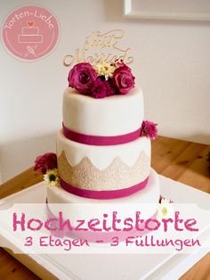 a three tiered cake with pink flowers on top and the words hohlzeltstorie 3 eglien - 3 pullen