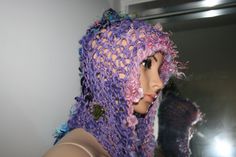 Totally unique! One in the world! Ready To Ship! Soft and fairy-like! Hand Made Freeform knitted forest fairy Hat! Unique. One Of A Kind Wearable Art.  Makes a lovely gift! Comes Gift Wrapped! Lovely colours, blue, pink, lilac purple, green and black tones.  You will be the only one in the world to wear this hand made knitted item! Each item that I make is slightly different because it's hand made and colours vary. You will be receiving the actual item in these photos, it's already made and read Fairy Hat, Crochet Kids, Black Tones, Spin Art, Pink Lilac, Art Yarn, Freeform Crochet, Forest Fairy, Lilac Purple