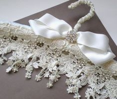 the bridal garter is adorned with white lace