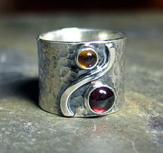 Sterling silver wide band ring with garnet and by LavenderCottage Hand Forged Sterling Silver Wide Band Ring As Gift, Unique Hand Forged Wide Band Ring, Unique Silver Garnet Rings, Unique Silver Garnet Jewelry, Artisan Wide Band Jewelry As Gift, Unique Citrine Birthstone Jewelry, Unique Hand Forged Wide Band Jewelry, Unique Hand Forged Sterling Silver Wide Band Ring, Hand Forged Wide Band Jewelry Gift