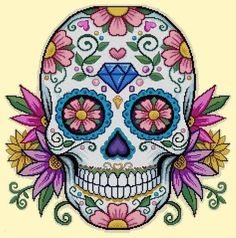 a cross stitch skull with flowers on it's forehead and the face painted in bright colors