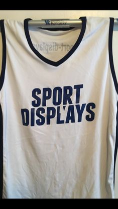 a white and black shirt with the words sport displays printed in blue on it's chest