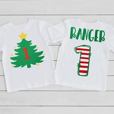 Celebrate your little one's special day with our adorable One Christmas Tree First Birthday Shirt! Perfect for the festive season, this Christmas 1st Birthday Shirt combines holiday cheer with the joy of a first birthday. Made from soft, breathable fabric, it ensures all-day comfort during celebrations and cake smash sessions. This charming outfit is ideal for memorable photos and holiday gatherings. Dress your little angel in this delightful Christmas Tree First Birthday Cake Smash Outfit and c Christmas Birthday Party Shirts, Christmas Birthday Squad Shirts, Christmas Theme Birthday Shirt, Grinch First Birthday Outfit, Sweet White T-shirt For First Birthday, 1st Birthday Shirts, First Birthday Shirts, Cake Smash Outfit, Birthday Cake Smash