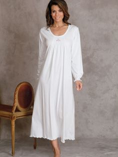 Inspired by the ethereal beauty of a wedding gown, pure White pima cotton jersey creates a nightgown so soft to the touch and so pretty to behold, it makes you feel forever young. Made in Peru, it boasts delicate hand smocking and hand-embroidered rosebuds in front and around the wrists. Blouse Outfit Casual, Nightgown Pattern, Luxury Nightwear, Night Gowns, Eileen West, V Dress, Cotton Nightgown, Cotton Sleepwear, Pretty Lingerie