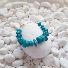 A beautiful, luxurious and feminine bracelet that will elevate any look! Wear alone or layer it for the ultimate effortless summer chic look! ~Turquoise semi precious stone ~Crafted in 925 Sterling silver with 14k gold plating ~ Adjustable length from 16 to 19cm ~Every item is handmade to order in Chania for you by me and the production time before shipping is 1-3 business days Elegant Turquoise Bracelets For Beach, Turquoise Gemstone Beads Bracelets For Beach, Bohemian Turquoise Stone Bracelet, Turquoise Beaded Howlite Bracelets, Turquoise Beaded Bangle With Natural Stones, Turquoise Bangle Beaded Bracelets With Natural Stones, Turquoise Bangle With Natural Stones, Elegant Turquoise Beaded Bracelets With Natural Stones, Turquoise Howlite Bracelets With Natural Stones