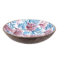 a wooden bowl with blue, red and white designs on the rim is shown against a white background