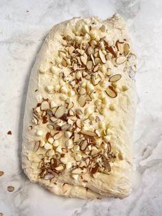 This White Chocolate Almond Sourdough Bread is sweet and flaky, with an irresistible buttery, almond flavor. Stuffed with a homemade almond paste, white chocolate chips and almonds this sweet sourdough mix-in is a must try! White Chocolate Sourdough Bread, Asiago Sourdough Bread, Sourdough Bread Mix Ins, Sourdough Gift Ideas, Holiday Sourdough, Flavored Sourdough Bread, Sourdough Inclusions, Flavored Sourdough, Cottage Baking