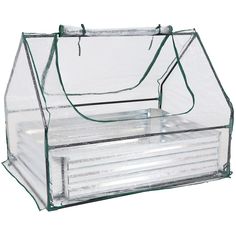 a clear plastic box with four sections and no lid on the bottom, set against a white background