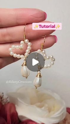 the video is showing how to make beaded earrings with pearls and gold beads on them