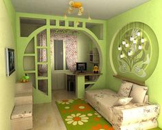 a room with green walls and furniture in the corner, including a bed that has pillows on it