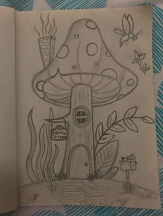 a drawing of a mushroom house in a book