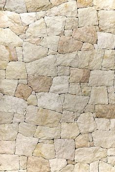 an image of a stone wall that looks like it is made out of rocks