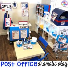 a classroom with desks, chairs and mailboxes on the wall that read post office dramatic play